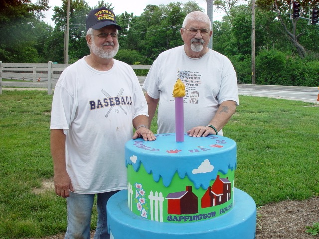 At Thomas Sappington House, Ken Hampton on left and Tom Ford on right, both of Vietnam Veterans Post 1028 doing service project to put up flag pole at Father Dickson Cemetery, June 2, 2014.<br />Photo by Stephen Hanpeter