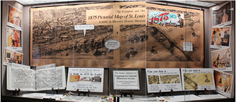 The September 2015 display case at Oak Bend Library features the 1875 pictorial maps of St Louis and the graphics in the exhibit, "Wa Walk in 1875 St Louis" at the Missouri HIstory Museum.