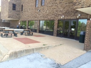 Picnic tables and doors to the Sperreng cafeteria.