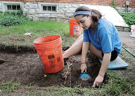 Lindbergh High School student Alexis Klosterman digs for artifacts on the grounds of The Thomas Sappington House Museum. photo by Diana Linsley.