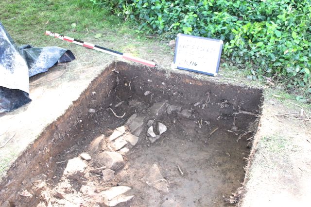 A section of the limestone foundation found in excavation unit one.