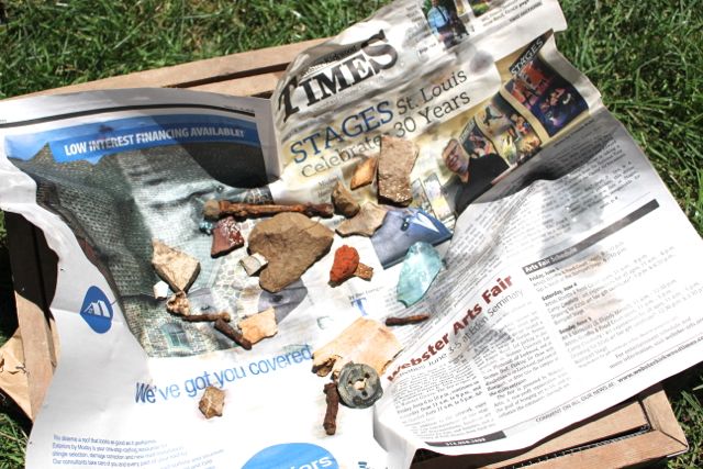 An assortment of items found in the dig at Sappington House. Items in tray drying after washing.