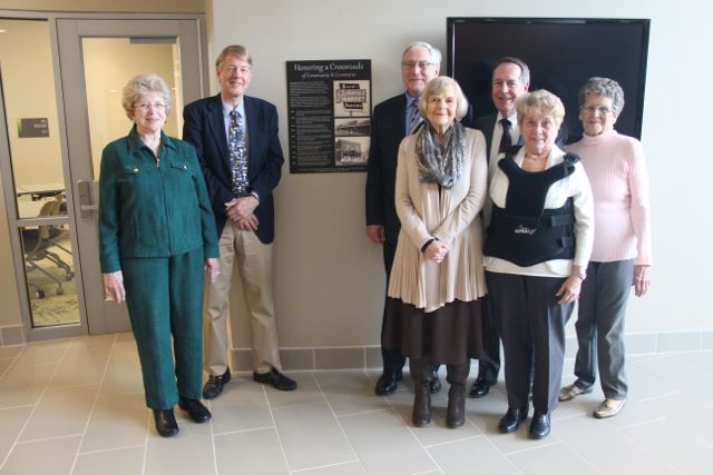 SCHS board members in front ot plaque donated to the Lindbergh Schools. 